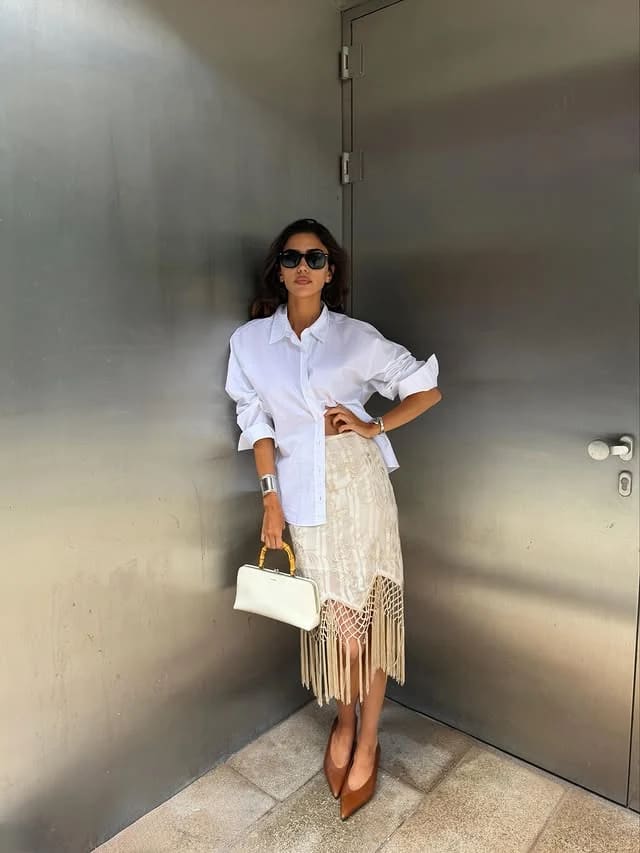 White Shirt Cream Fringe Skirt Outfit with Tan Heels