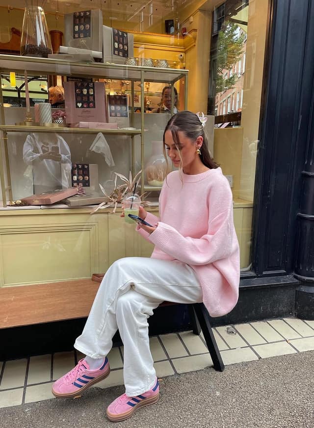 Pink Oversized Sweater Outfit with White Wide-Leg Trousers