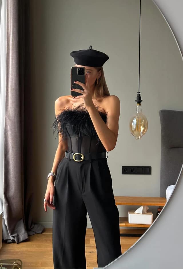 Black Feather Corset Top Outfit with Wide-Leg Trousers