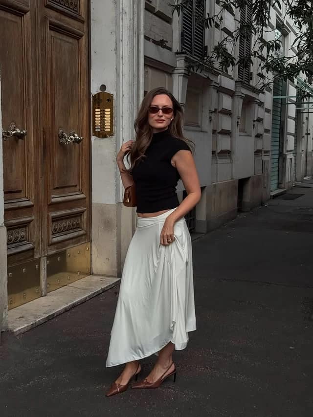 Black Turtleneck White Midi Skirt Outfit with Brown Bag