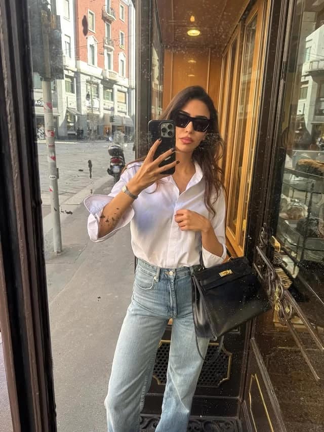 White Shirt Light Wash Jeans Outfit with Black Bag