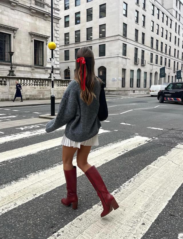 Grey Oversized Sweater Outfit with Pleated Mini Skirt and Burgundy Boots