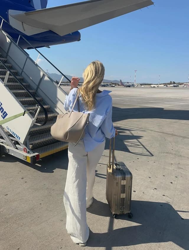 White Linen Wide-Leg Trousers Blue Shirt Airport Outfit