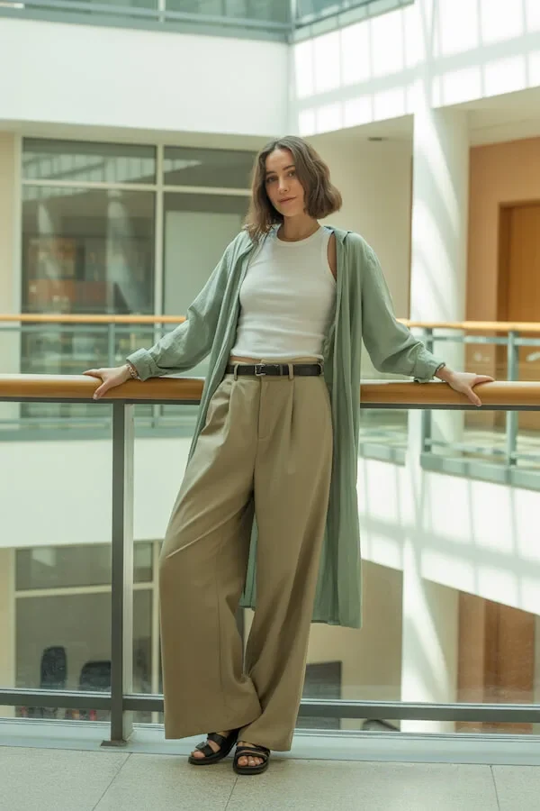 Sage Green Duster Coat Outfit with Beige Wide-Leg Trousers