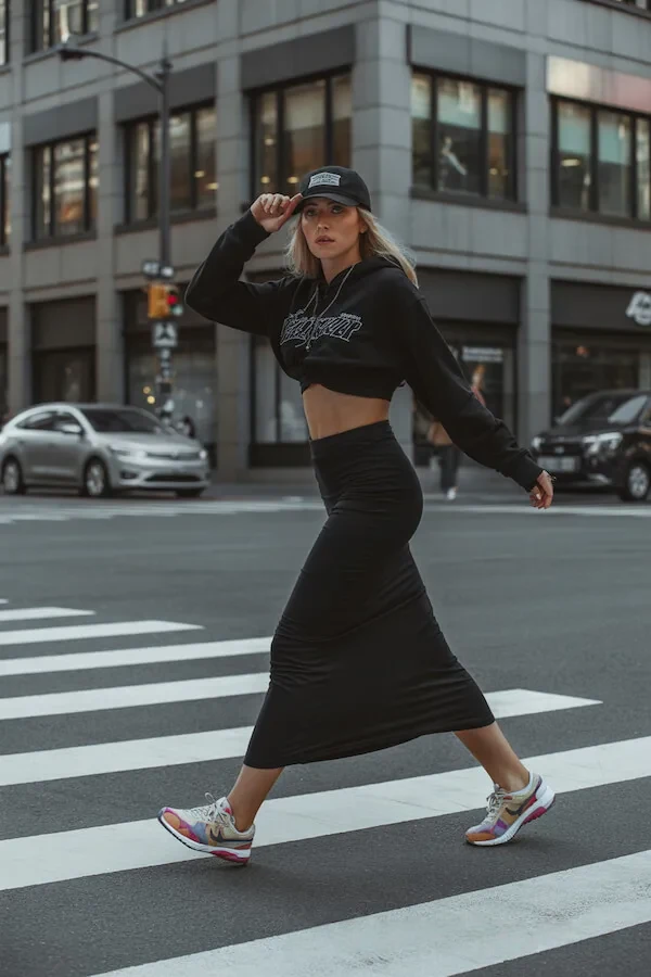 Black Cropped Hoodie Midi Skirt Outfit with Sneakers