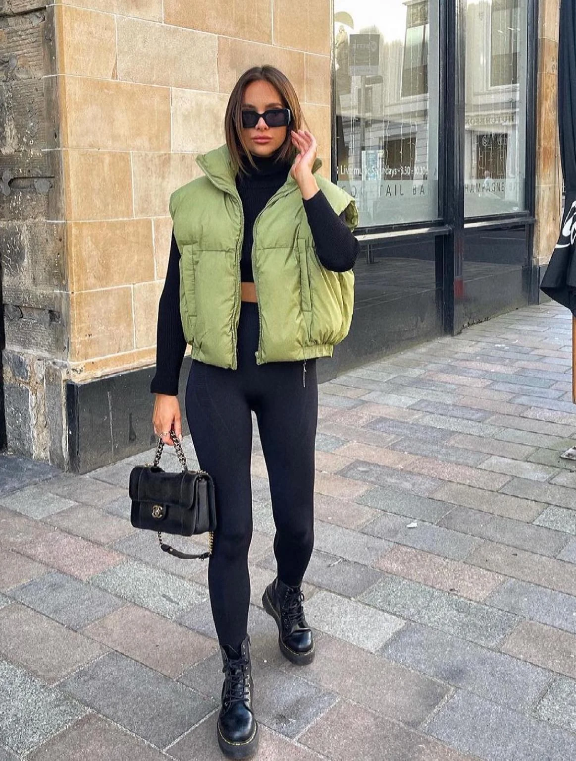 Olive Green Puffer Vest Outfit with Black Leggings