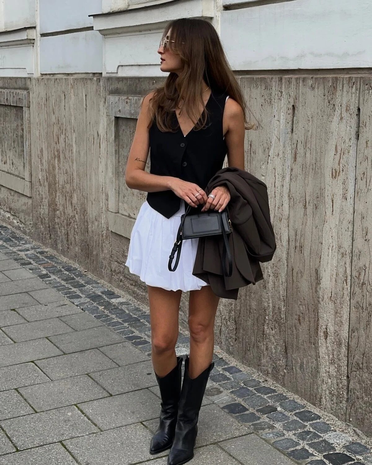 Black Vest White Tennis Skirt Knee-High Boots Outfit