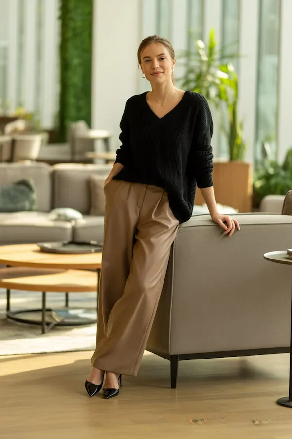Black Oversized Knit Sweater with Beige Wide-Leg Trousers