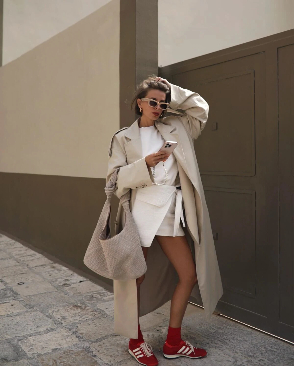 Beige Trench Coat White Mini Skirt Red Sneakers Outfit