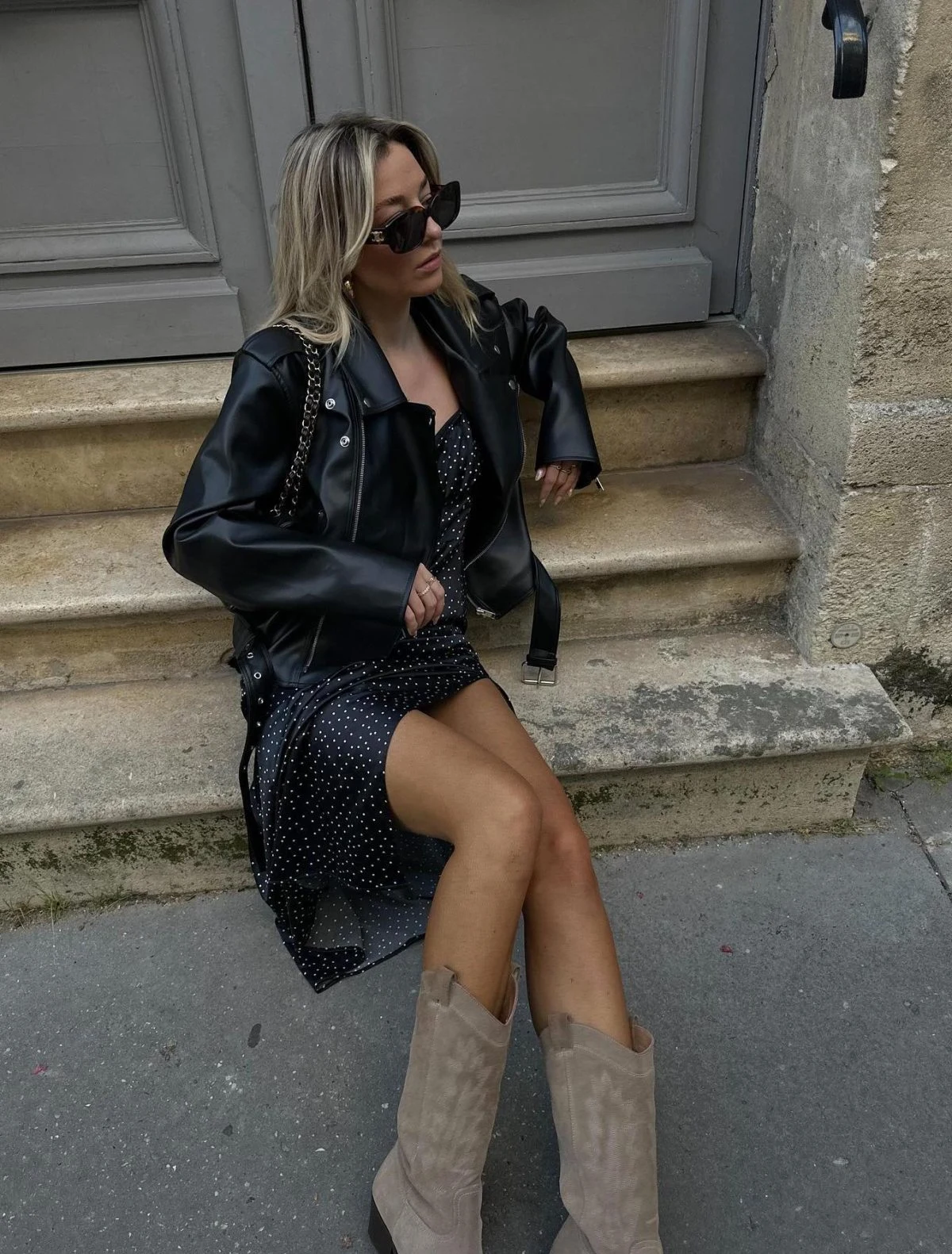 Black Leather Jacket Polka Dot Dress Outfit with Slouchy Boots