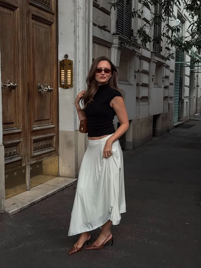 Black Turtleneck White Midi Skirt Outfit with Brown Bag