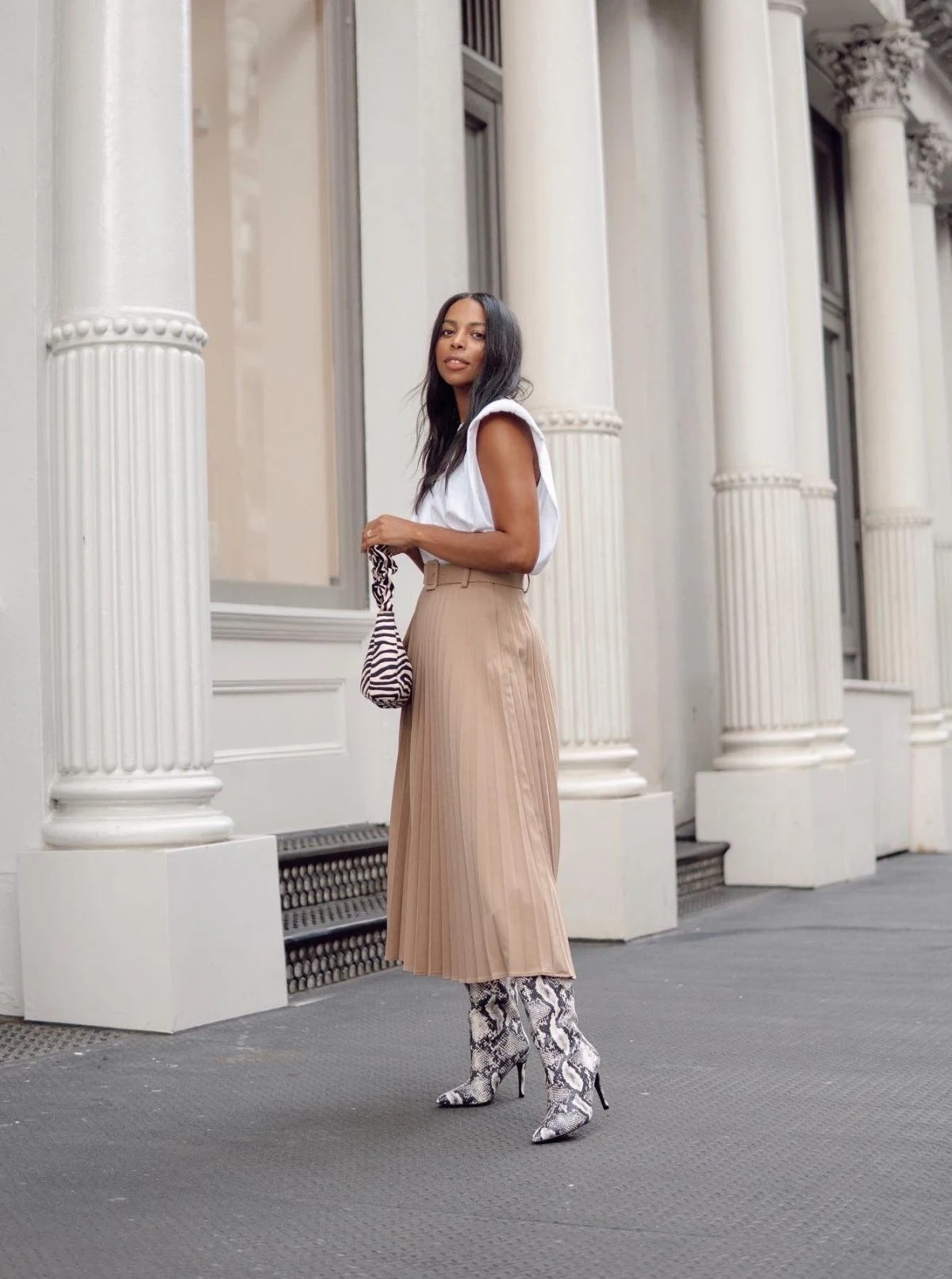 White Top Beige Pleated Midi Skirt Snake Print Boots Outfit