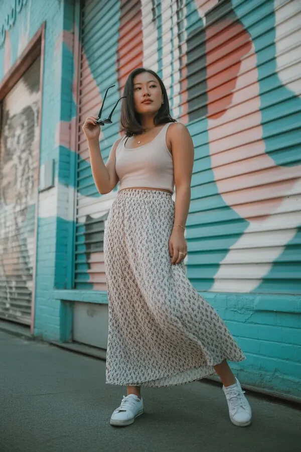 Beige Tank Top with Floral Midi Skirt and White Sneakers