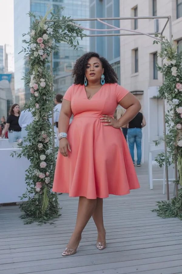Coral Pink Fit and Flare Dress with Turquoise Statement Earrings