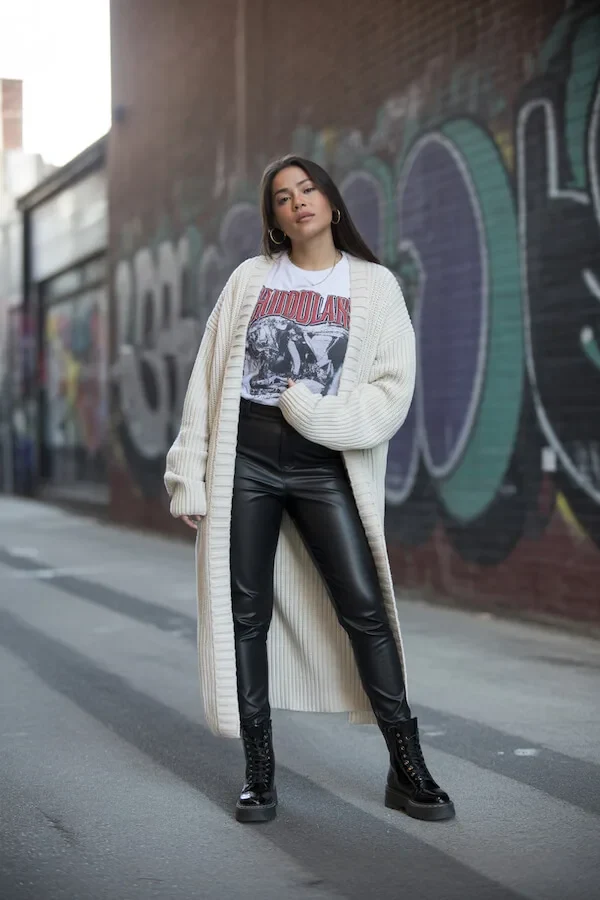 Cream Ribbed Cardigan with Graphic Tee and Leather Pants