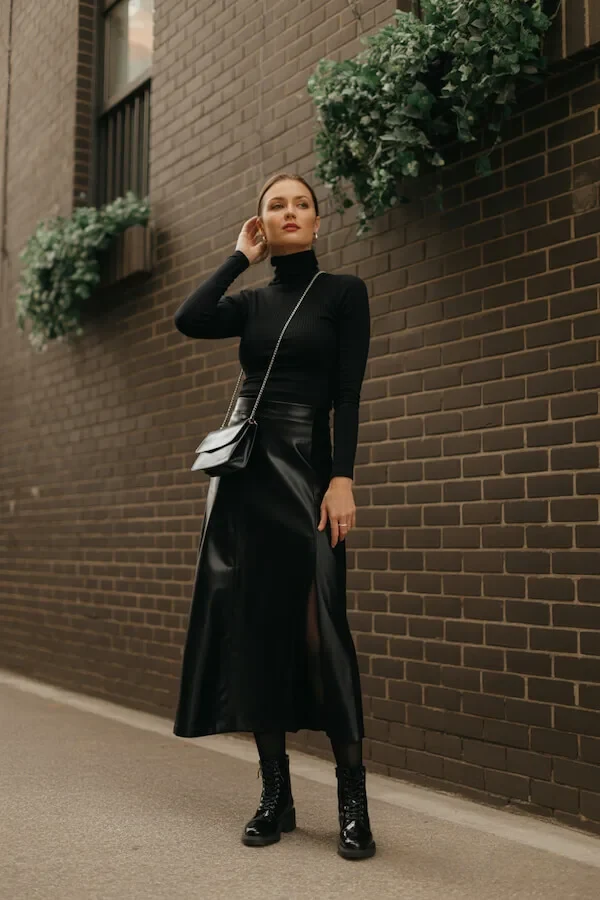 Black Turtleneck Leather Midi Skirt Outfit with Lace-Up Boots
