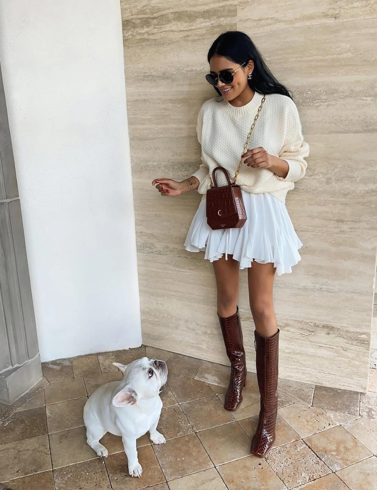 Cream Sweater White Mini Skirt Outfit with Brown Boots