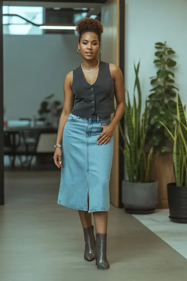 Black Vest Denim Midi Skirt Outfit with Leather Boots