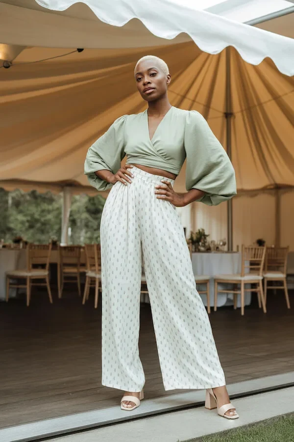 Sage Green Wrap Top and Cream Printed Wide-Leg Trousers Wedding Guest Outfit
