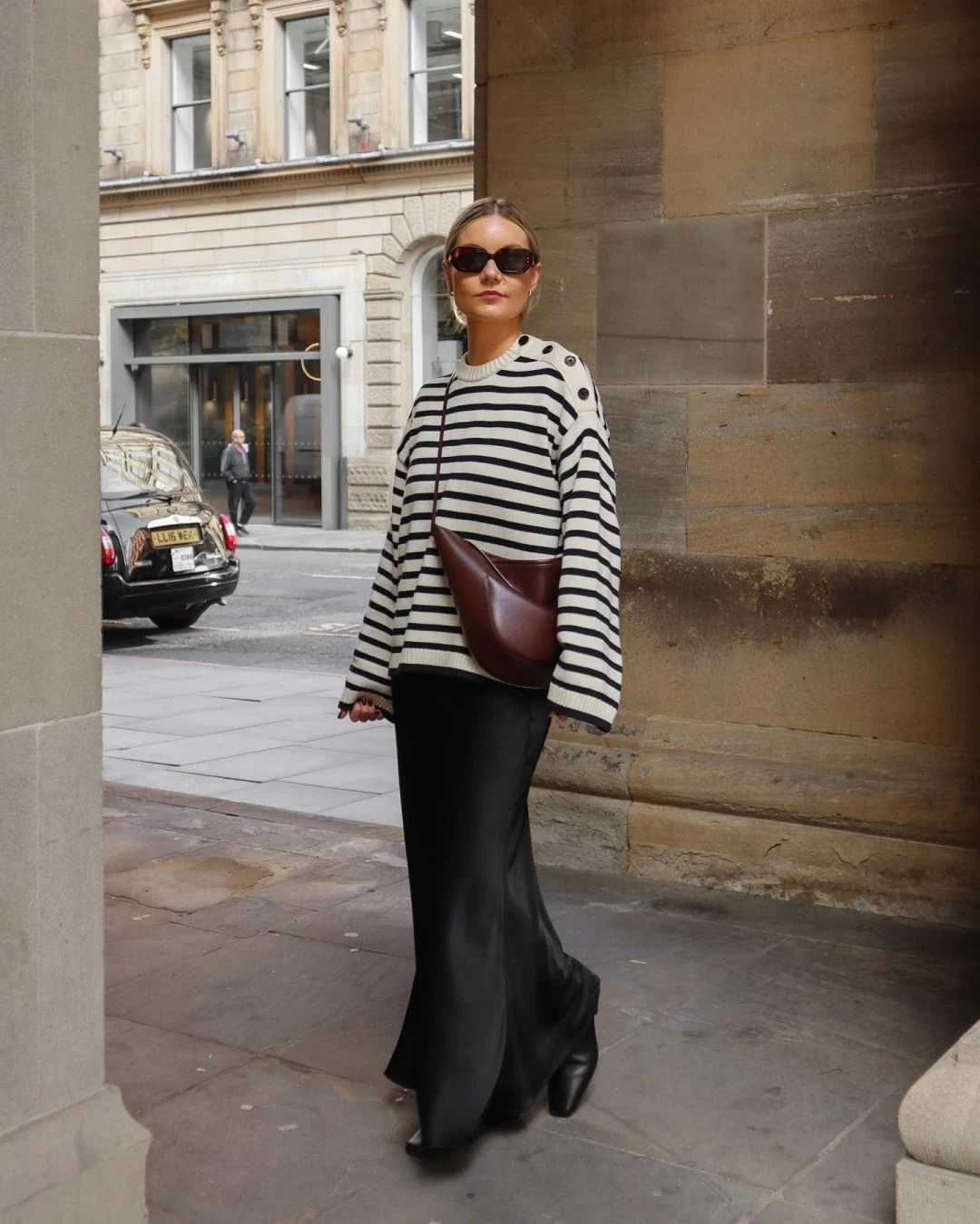 Striped Oversized Sweater Outfit with Wide-Leg Black Trousers