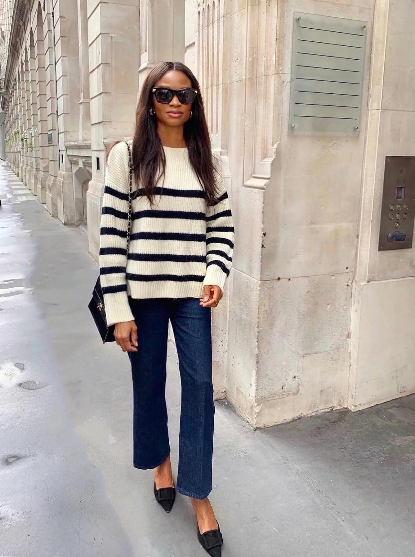 Cream Black Striped Sweater Outfit with Flared Jeans