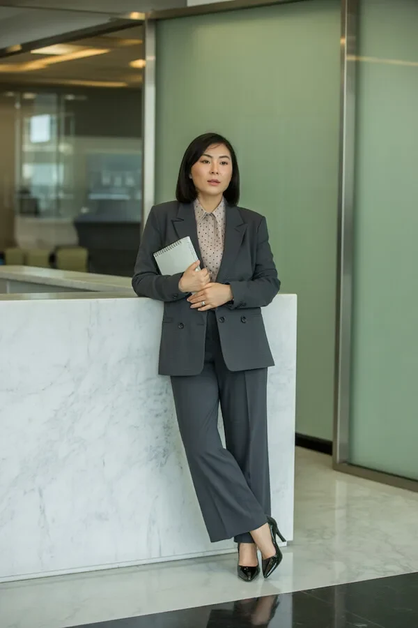 Charcoal Double-Breasted Suit with Polka Dot Blouse