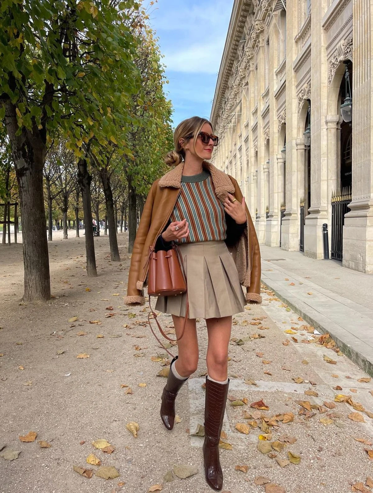 Shearling Jacket Pleated Skirt Outfit with Knee-High Boots