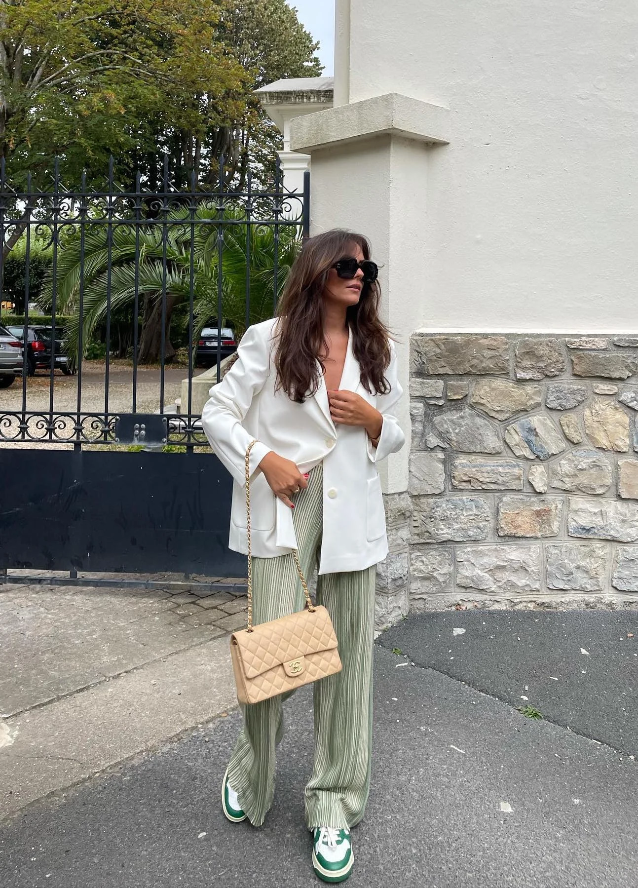 White Blazer Green Striped Trousers Outfit with Sneakers