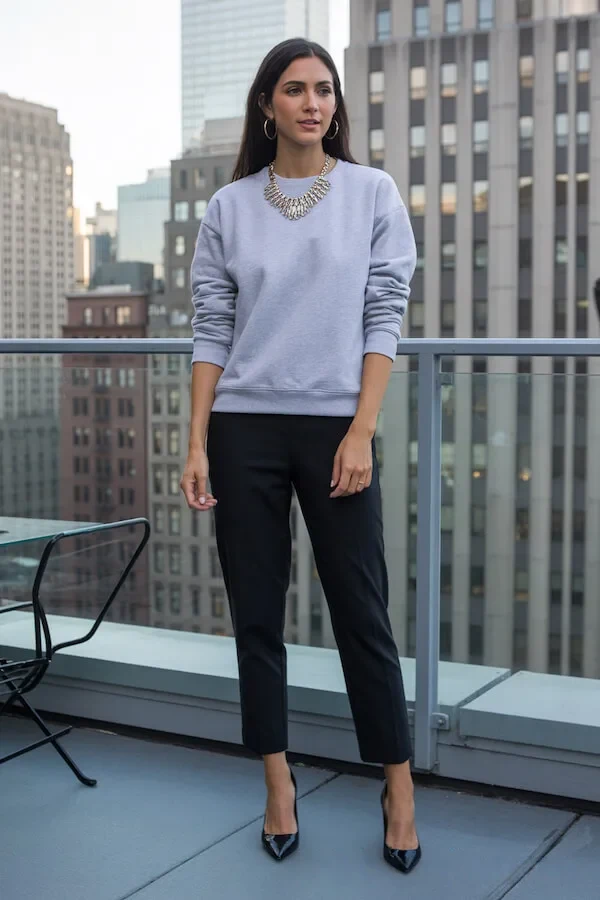 Lavender Sweatshirt Black Tailored Trousers Statement Necklace Outfit