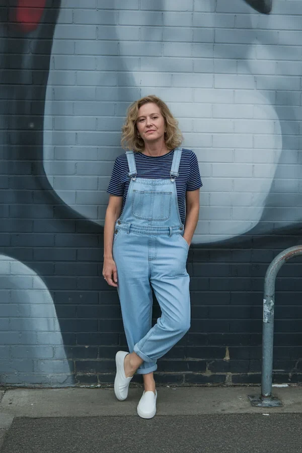 Light Wash Denim Overalls with Striped Tee and White Sneakers