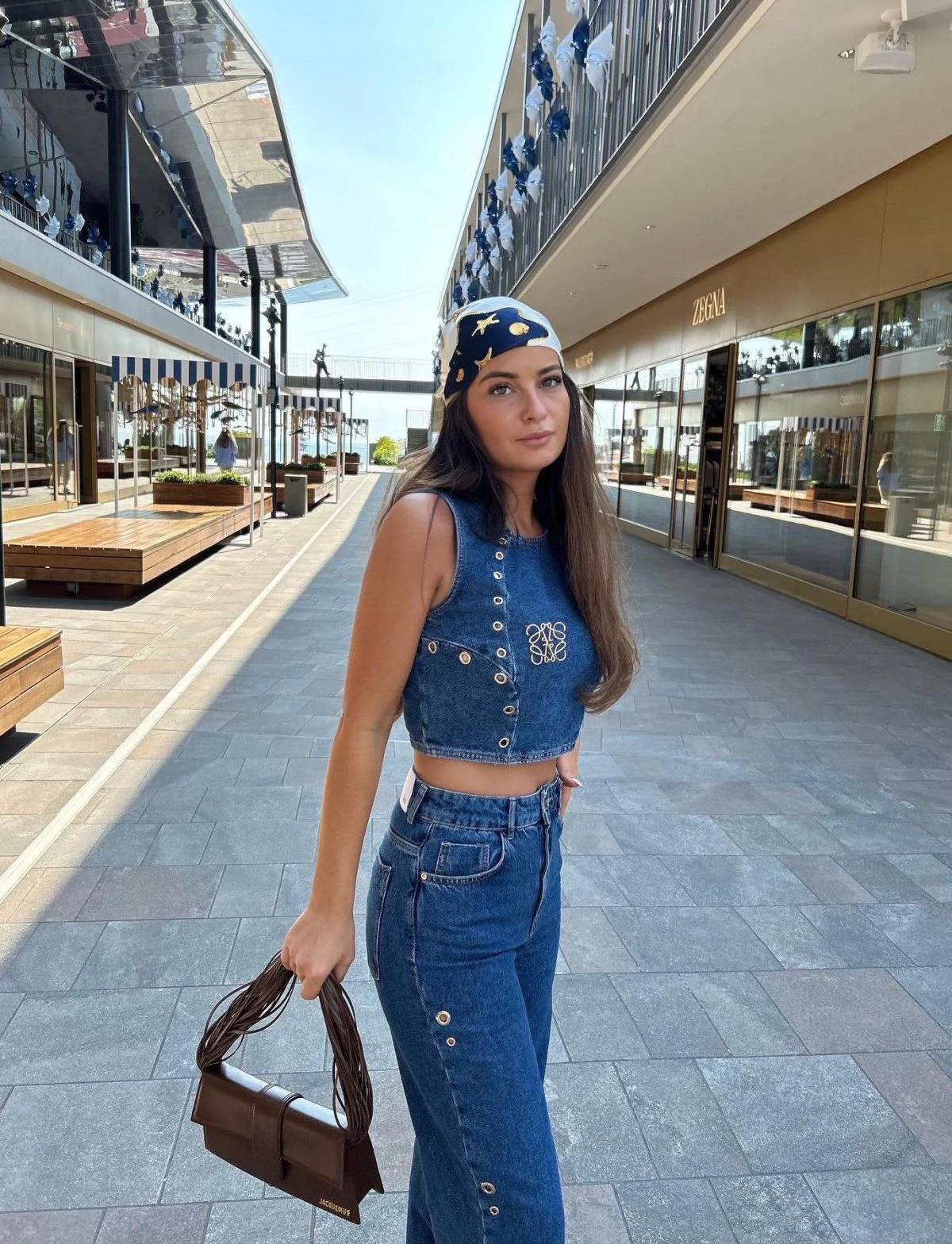 Denim Vest and Jeans Outfit with Brown Woven Bag