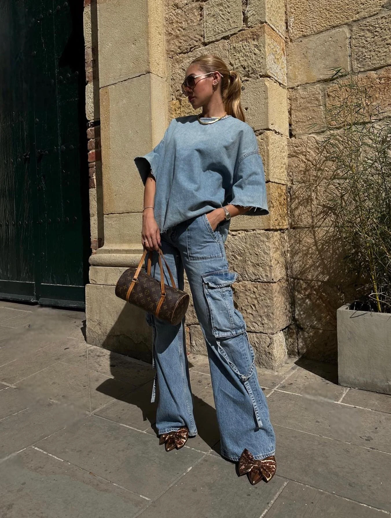 Blue Oversized Sweatshirt Cargo Jeans Outfit with Bow Mules