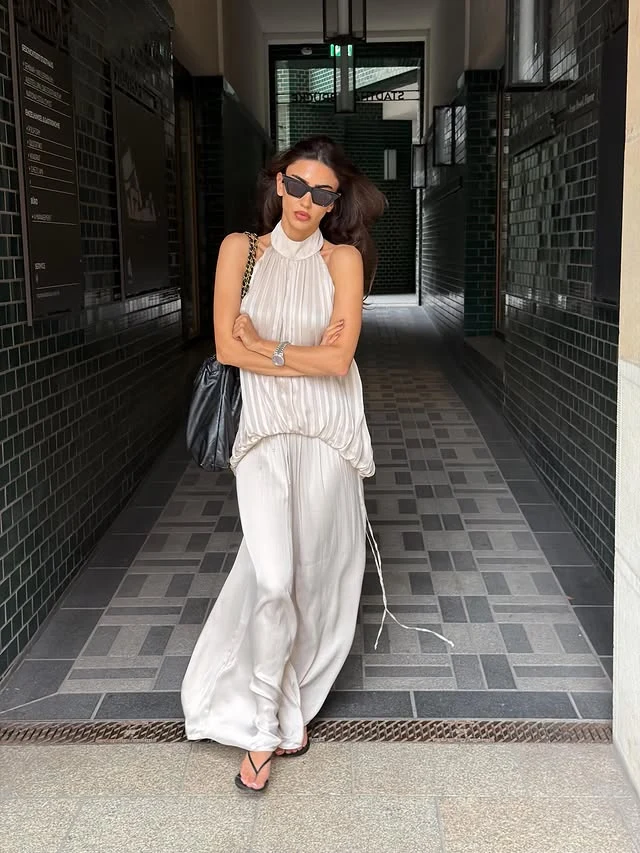 White Pleated Halter Top Outfit with Wide-Leg Trousers
