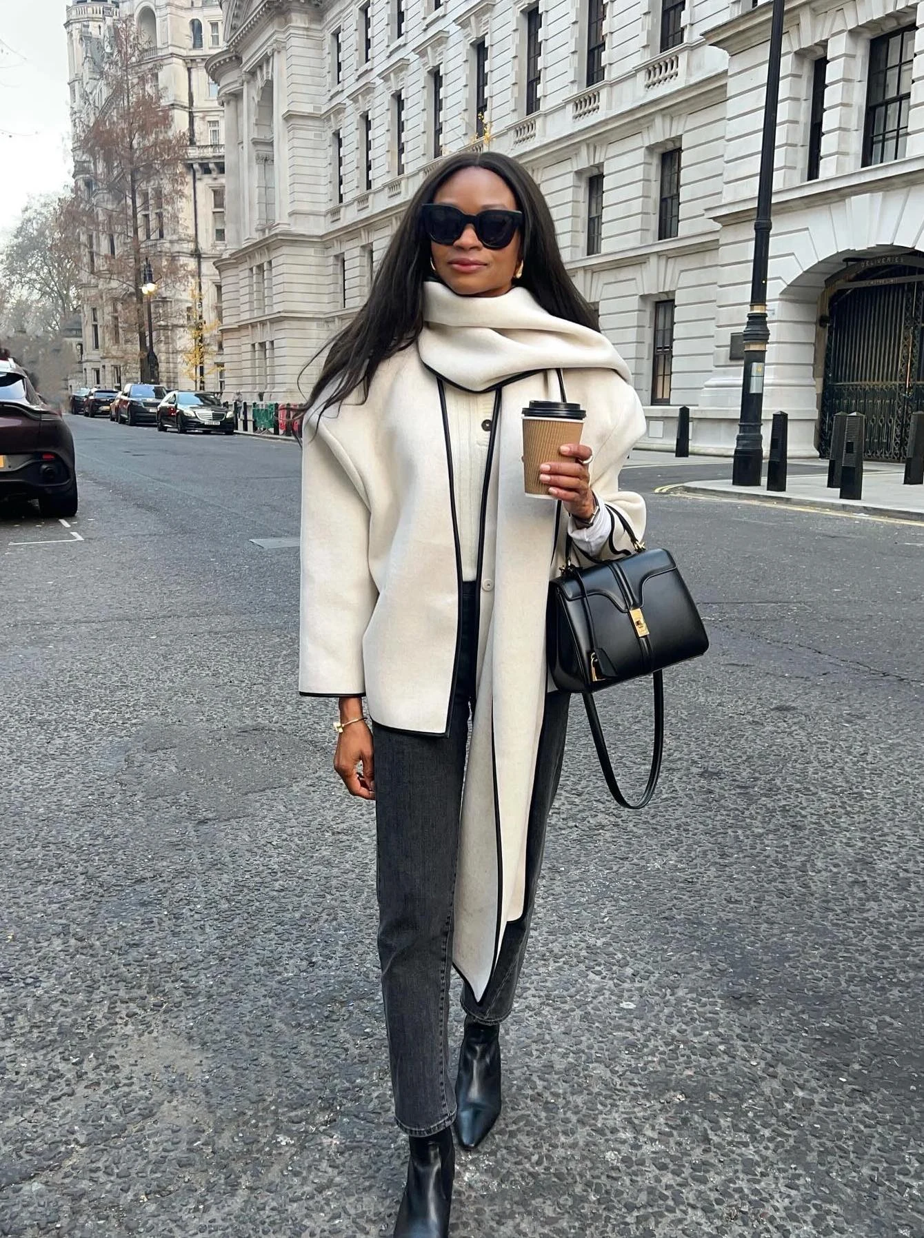 Cream Oversized Coat Outfit with Grey Jeans and Black Bag
