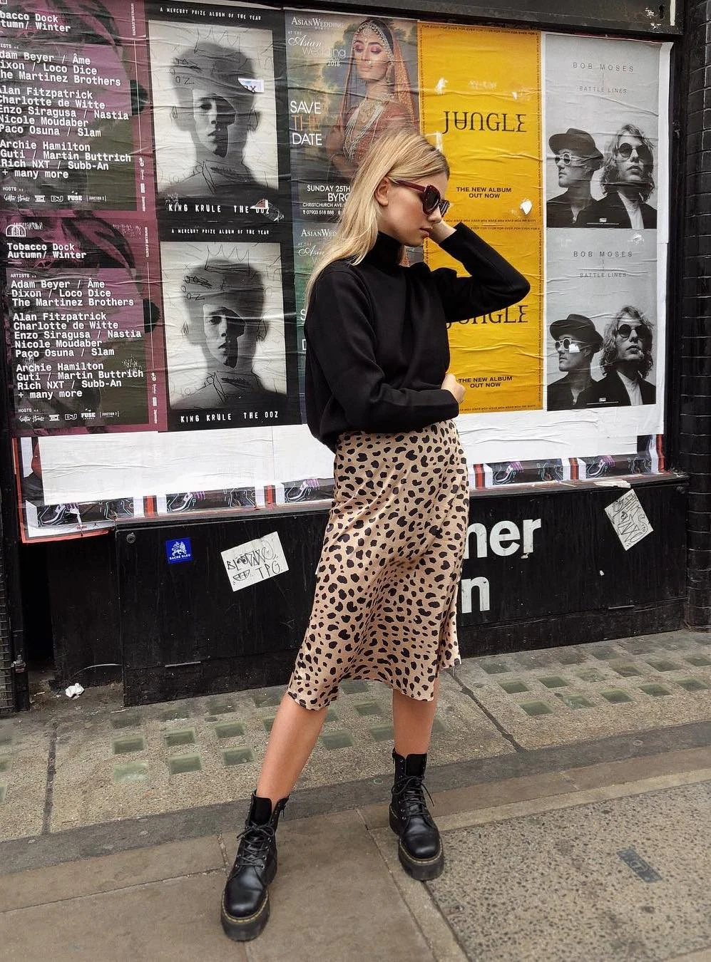 Black Turtleneck Leopard Print Skirt Outfit with Combat Boots