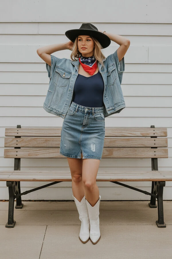 Light Wash Denim Skirt Outfit with White Cowboy Boots and Bandana Scarf