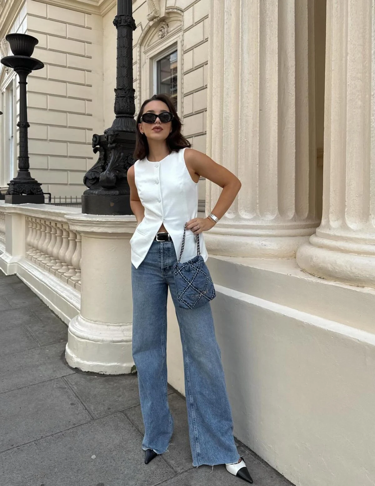 White Sleeveless Blazer Outfit with Wide-Leg Jeans