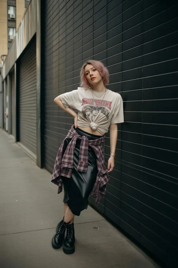 Graphic Tee Knotted with Leather Midi Skirt and Plaid Flannel