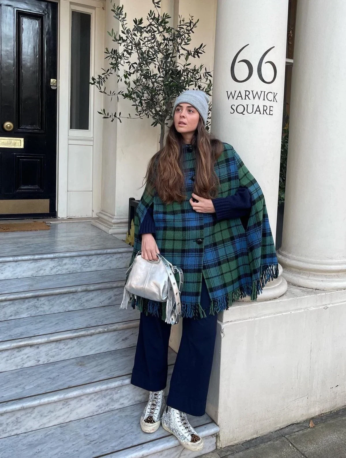 Tartan Cape Outfit with Wide-Leg Trousers and Metallic Boots