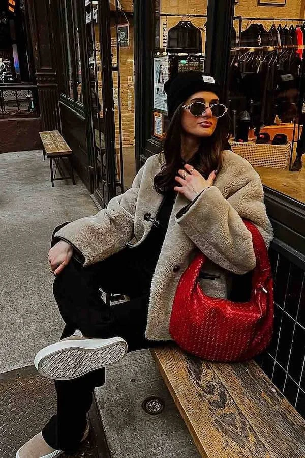 Beige Shearling Jacket Black Wide-Leg Pants Red Bag Outfit