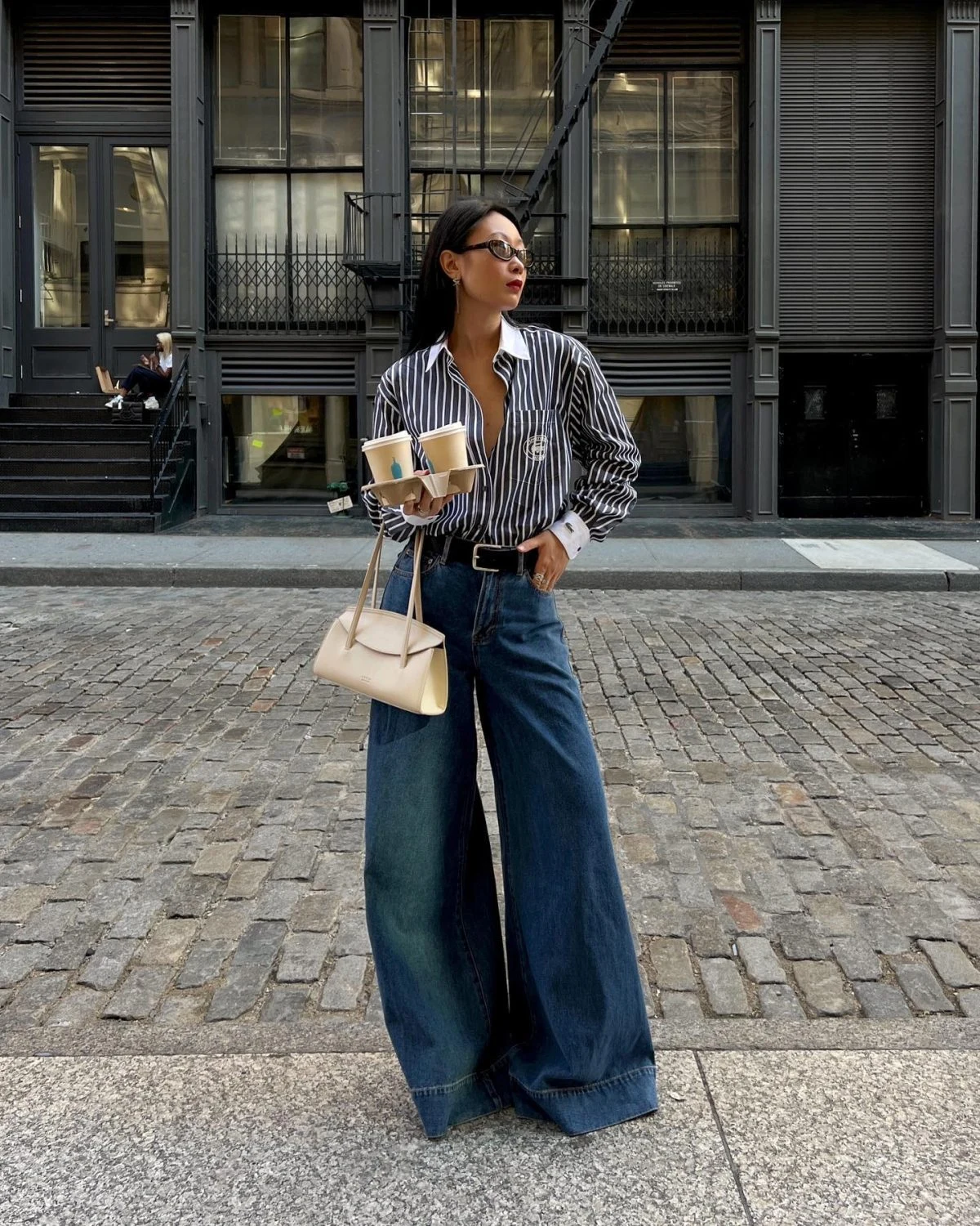 Striped Shirt Wide-Leg Jeans Outfit with Cream Bag