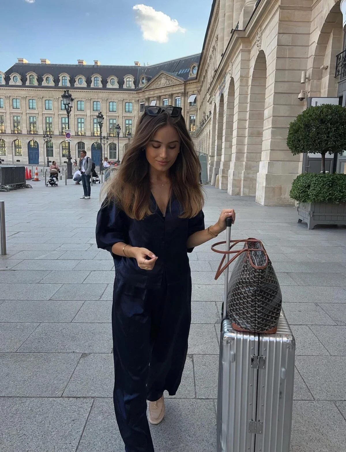 Navy Satin Shirt Travel Outfit with Tote and Sneakers
