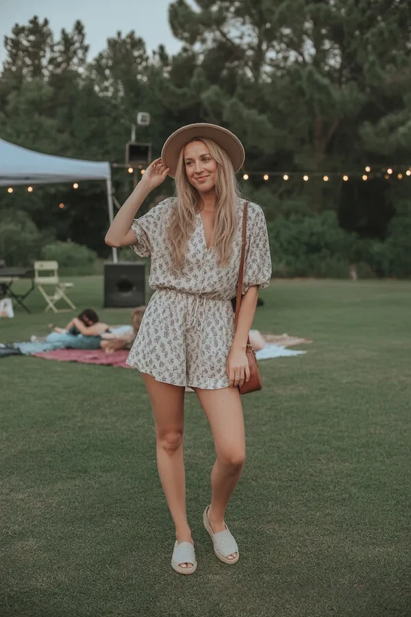 Cream Floral Romper Outfit with Tan Fedora for Outdoor Events