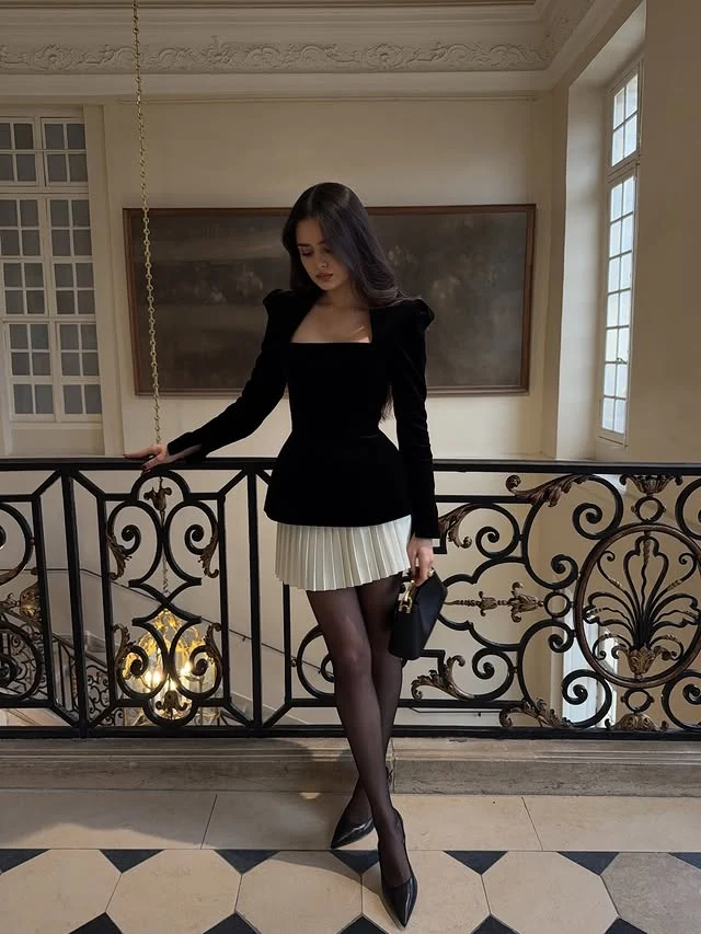 Black Puff Sleeve Top White Pleated Skirt Outfit