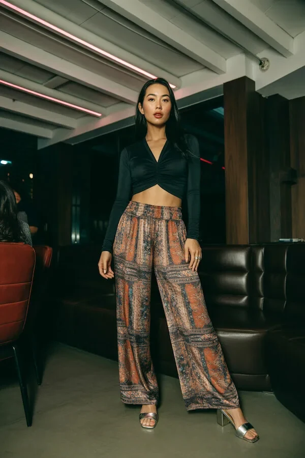 Black Cropped Wrap Top with Wide-Leg Patterned Trousers