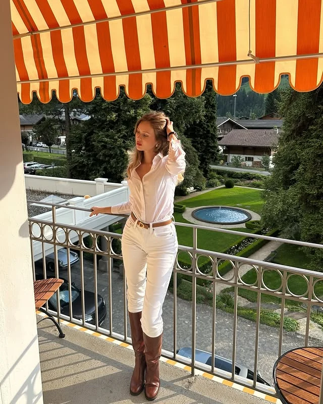 White Shirt Cream Jeans Brown Boots Vacation Outfit