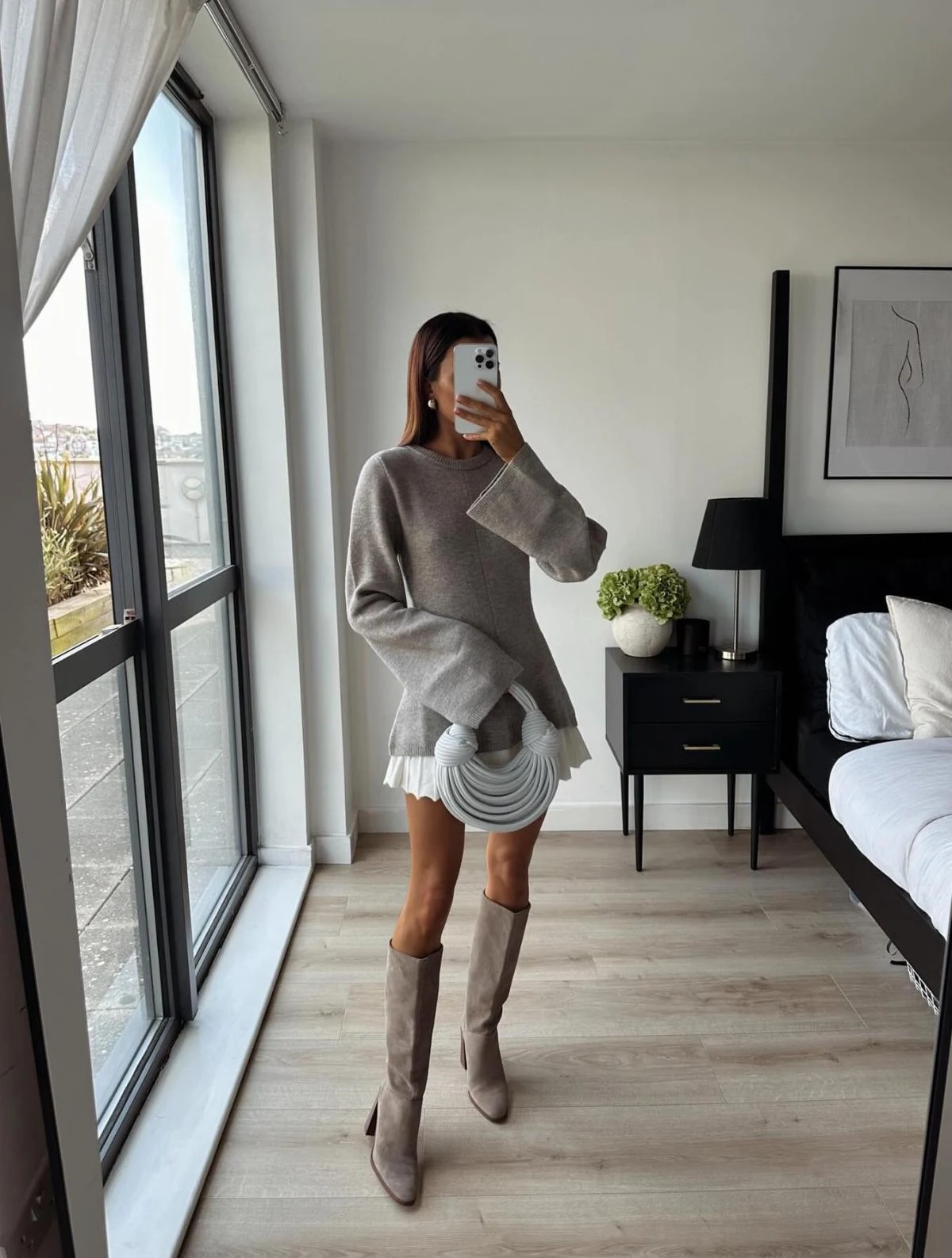 Grey Oversized Sweater White Pleated Skirt Taupe Boots Outfit