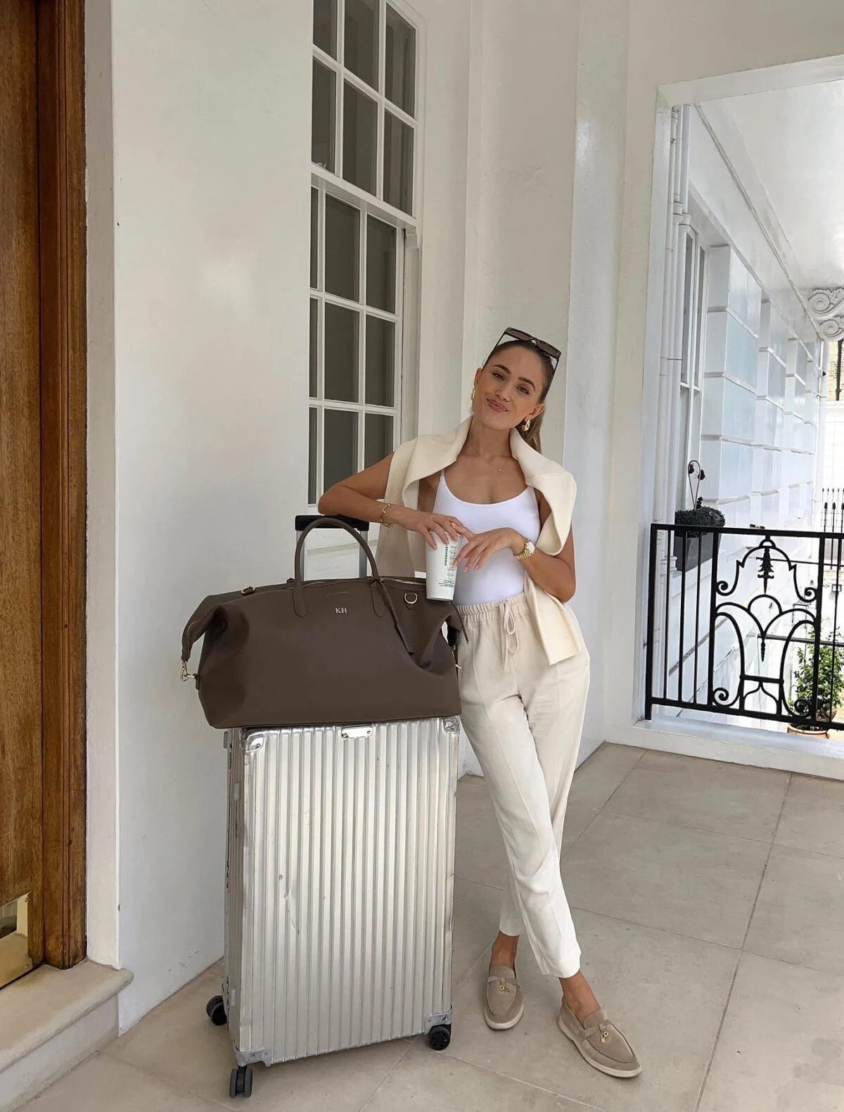 Cream Knit Vest Beige Joggers Airport Outfit