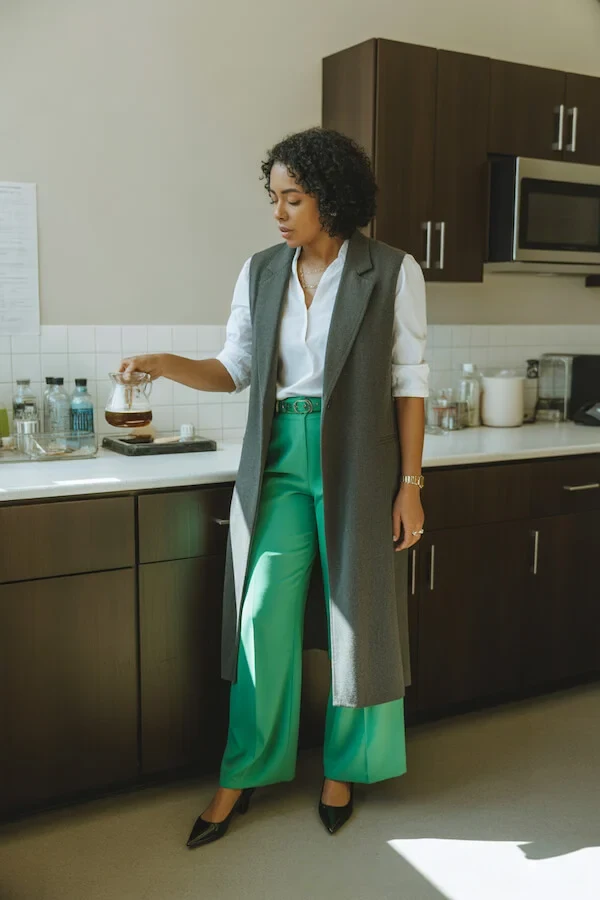 Gray Sleeveless Vest with Emerald Green Wide-Leg Trousers and White Shirt