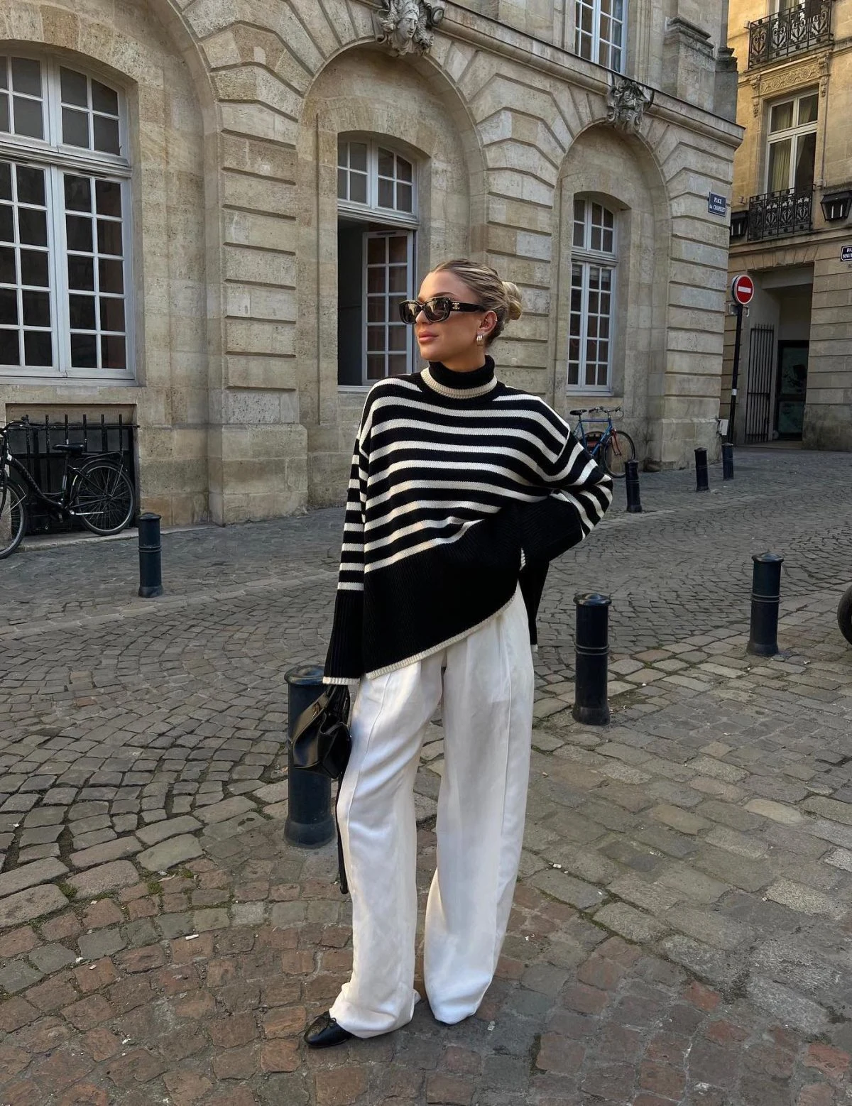 Black and White Striped Sweater Outfit with Wide-Leg Trousers
